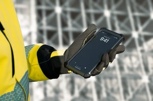 Worker-with-Xshielder-in-hand